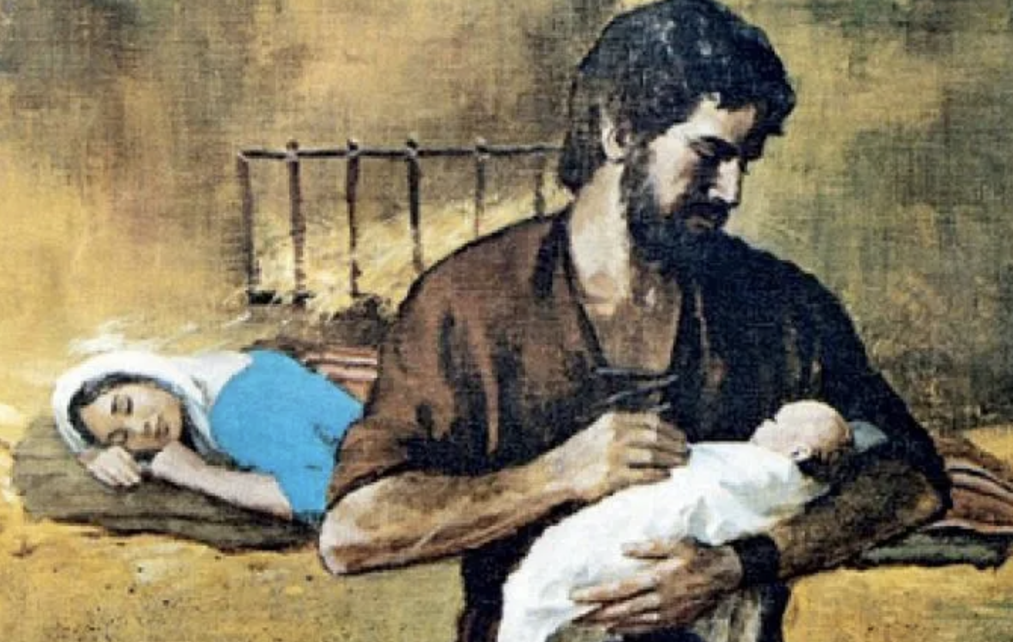 Joseph holds th new baby Jesus in his arms whilst Mary, dressed in blue, lies exhausted on the floor behind